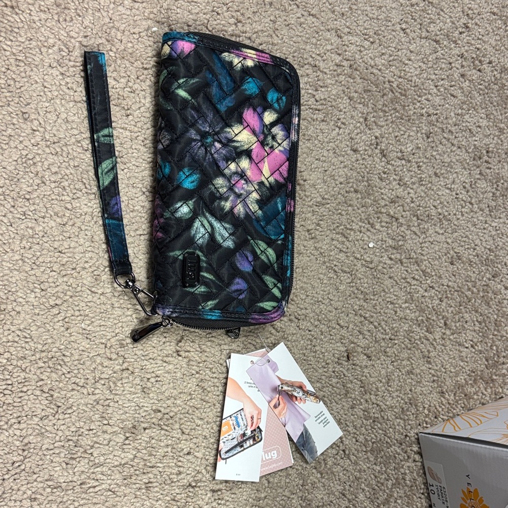 Quilted Wristlet Wallet in Black with Multicolor Leaf Print